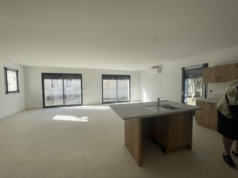 Villa mitoyenne T4 avec garage et jardin clos