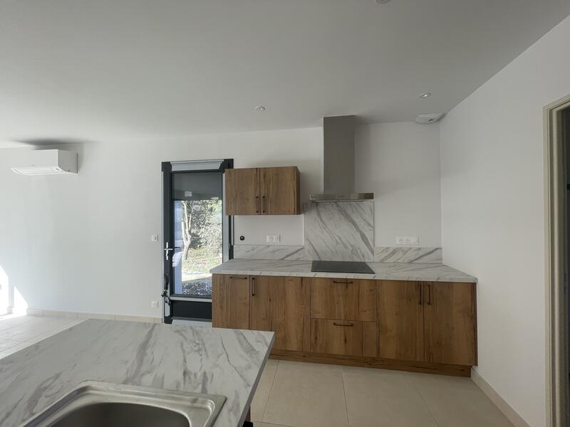 Villa mitoyenne T4 avec garage et jardin clos
