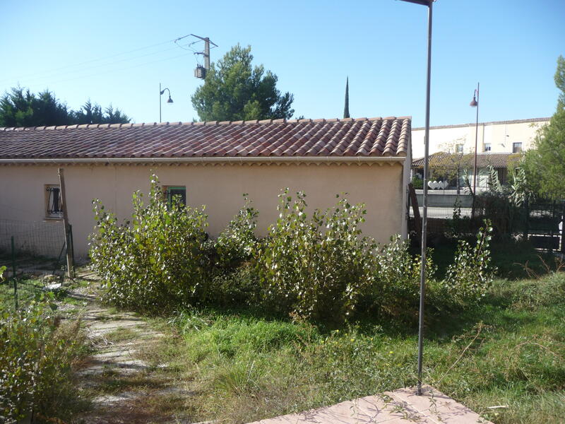 VIlla mitoyenne T4 avec jardin et garage.